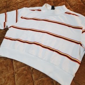 White long-sleeved mock neck crop sweater